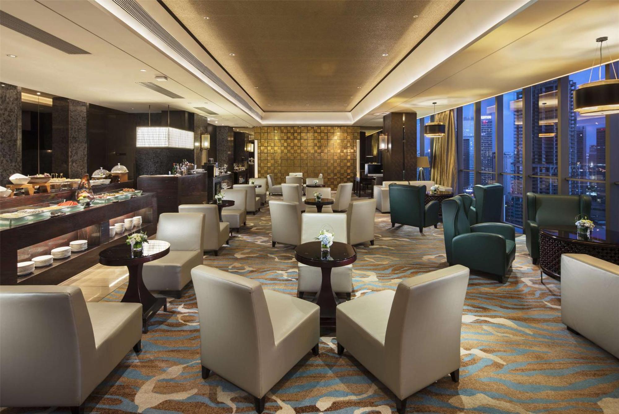 Hilton Guangzhou Tianhe Hotel Ngoại thất bức ảnh The Club lounge at Beijing Capital International Airport
